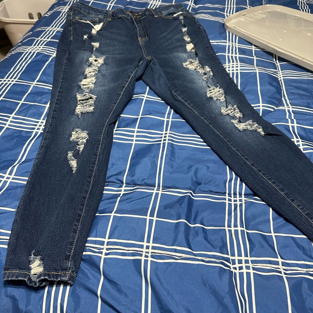Denim blue jeans / ripped style/ like new/ worn twice / asking for $25 paid $30
